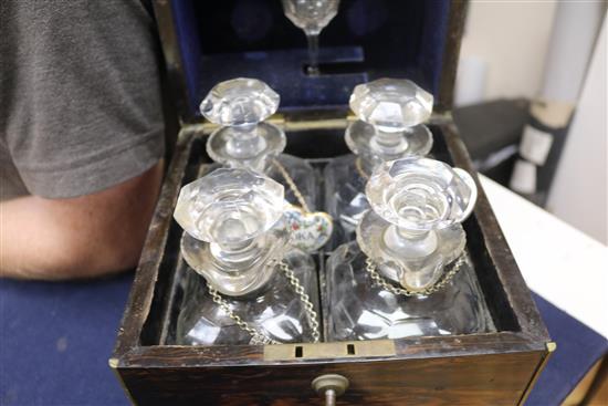 An Aspreys coromandel four-decanter box, fully-fitted, with liqueur glass and retailers label 22 x 22cm